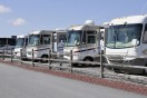 recreational vehicles at an rv dealer parking lot