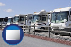 colorado map icon and recreational vehicles at an rv dealer parking lot