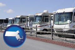 massachusetts map icon and recreational vehicles at an rv dealer parking lot