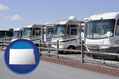 north-dakota map icon and recreational vehicles at an rv dealer parking lot
