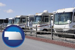 nebraska map icon and recreational vehicles at an rv dealer parking lot
