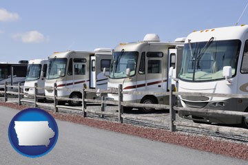 recreational vehicles at an rv dealer parking lot - with Iowa icon