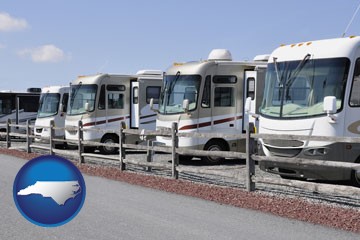 recreational vehicles at an rv dealer parking lot - with North Carolina icon
