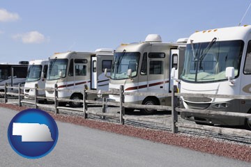 recreational vehicles at an rv dealer parking lot - with Nebraska icon